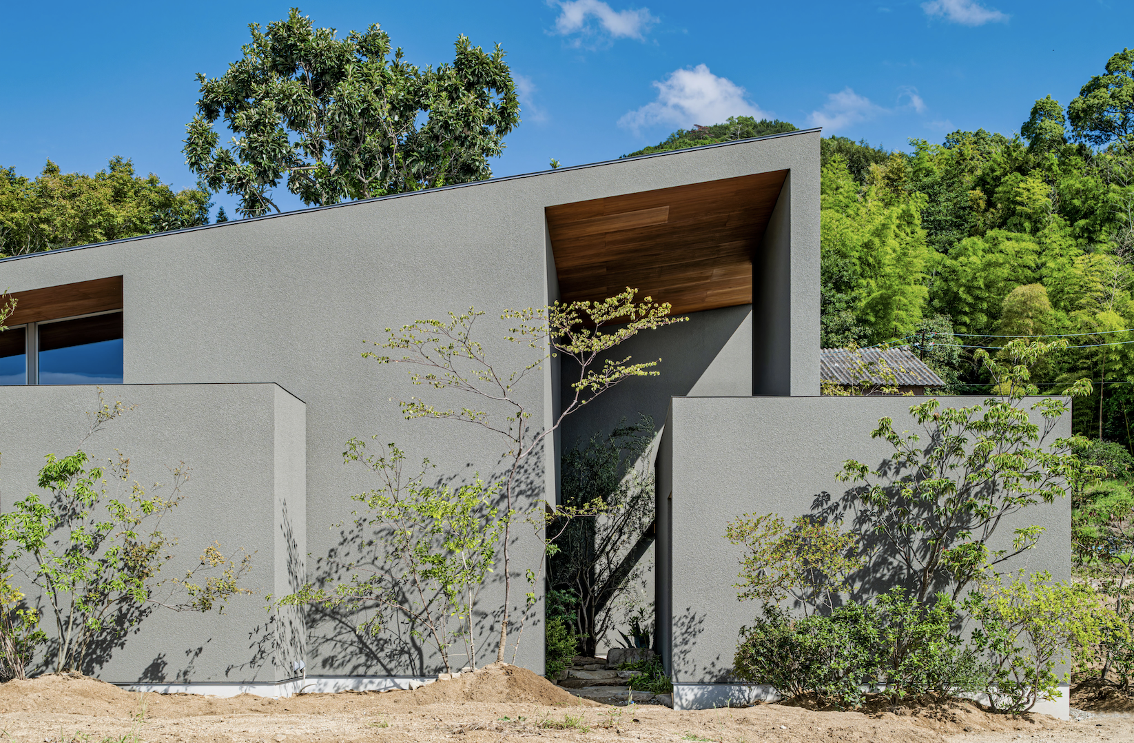 陰影と風景をつなぐ家